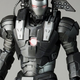 Illustration for article titled How Does War Machines Gun Work? Can He Sit Down? New Toy Pics Reveal All!
